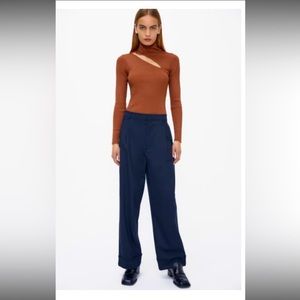 Zara. Cut- out knit top. Brick color. Woman’s size small. “Like New”